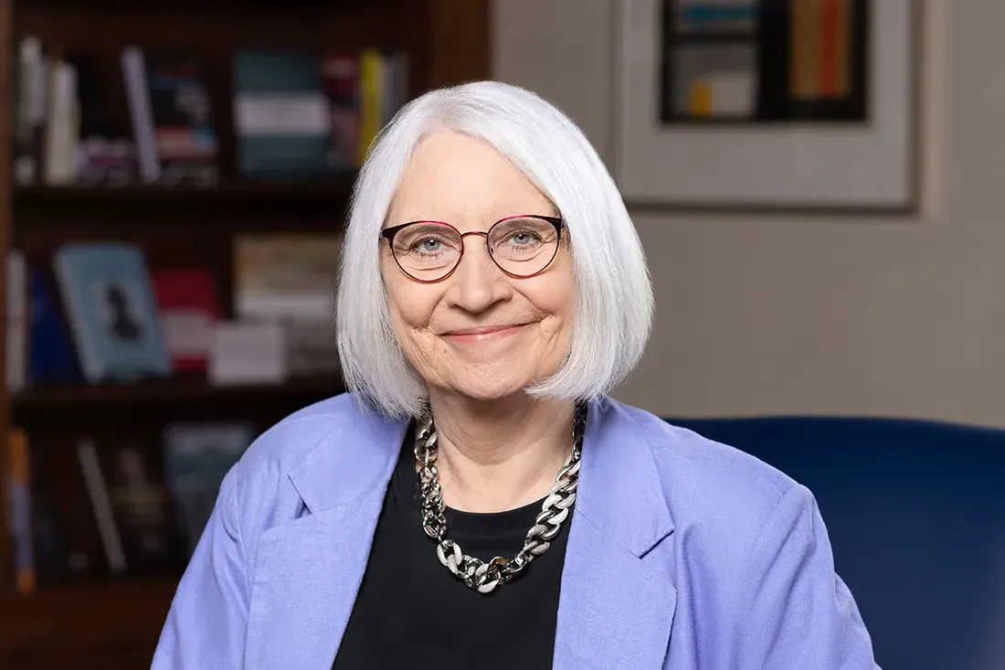 Lois Agnew sitting in an office.